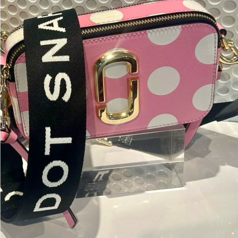 Pink and white polka dot Marc Jacobs bag.